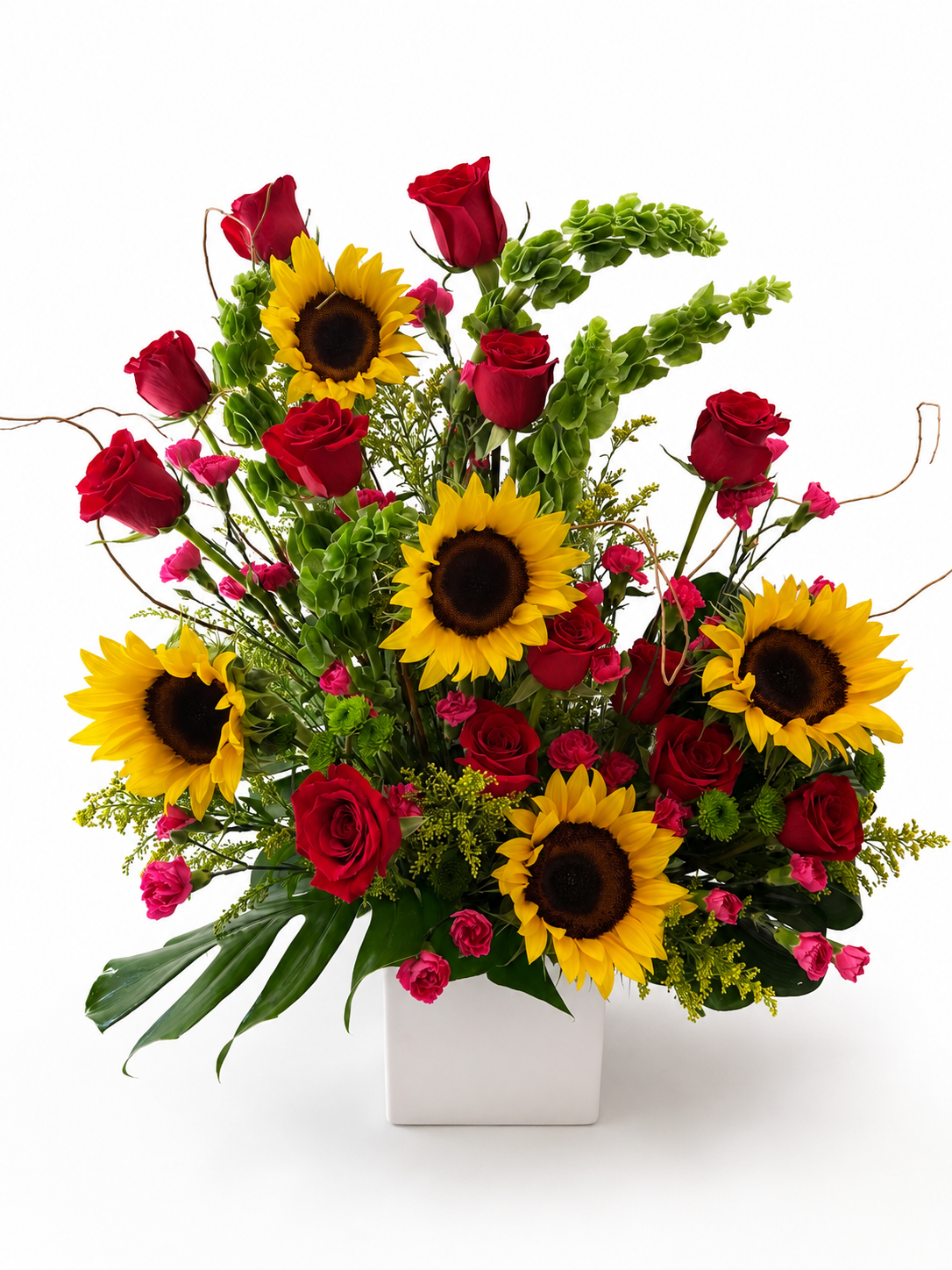 Bouquet of red roses and sunflowers with greenery in a white box on a white background