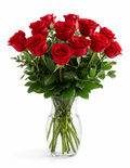 Bouquet of red roses in a clear vase on a white background