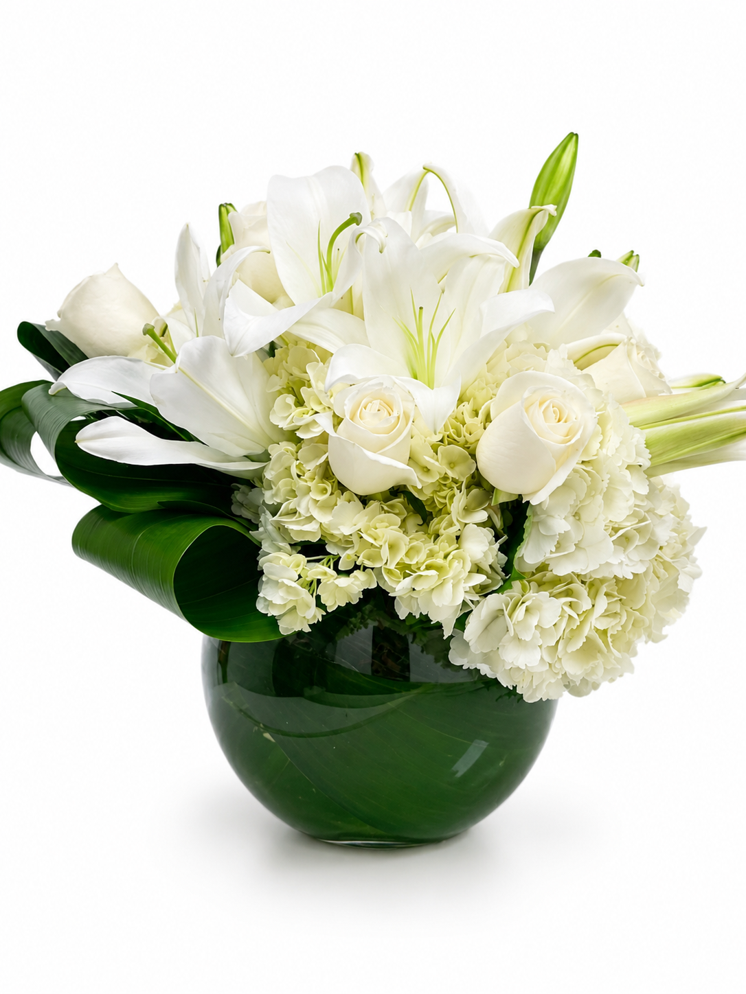 Bouquet of white and light green flowers in a green vase on a white background