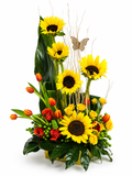 Floral arrangement with sunflowers, red and yellow roses, and orange tulips