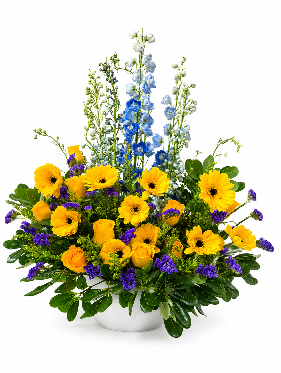 Flower arrangement of yellow daisies, yellow roses. blue delphinium and purple statice flowers